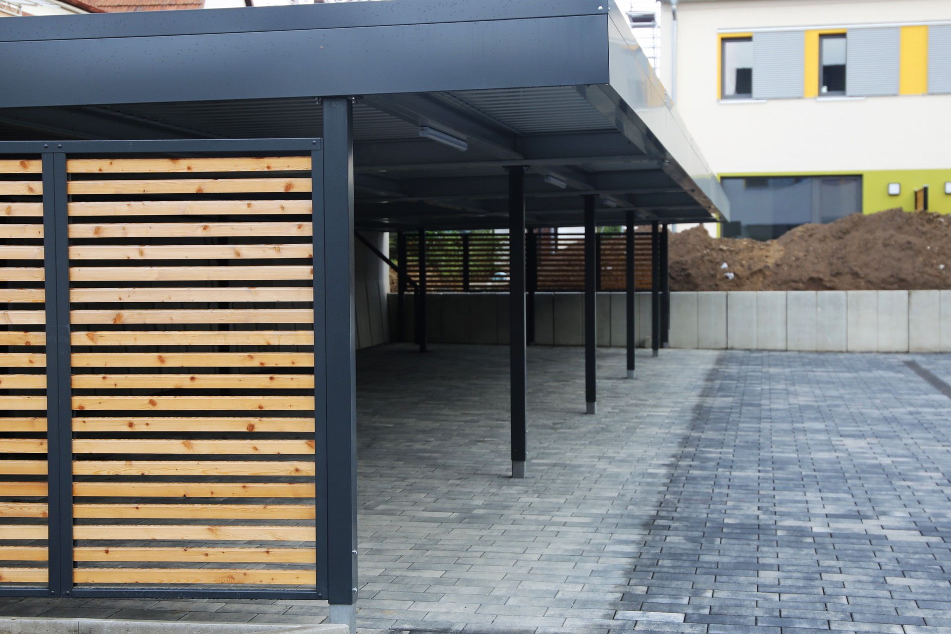 Modern carport system at a residential complex